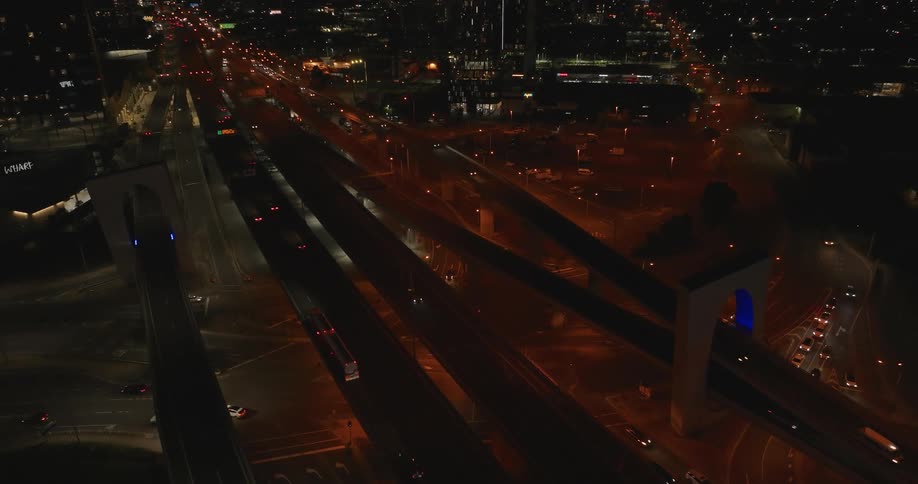 Panorama of highways in a metropolis at night with vehicle traffic