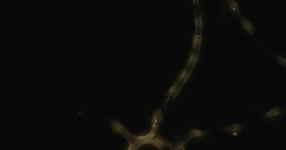 Aerial panorama at night of highways with vehicle traffic