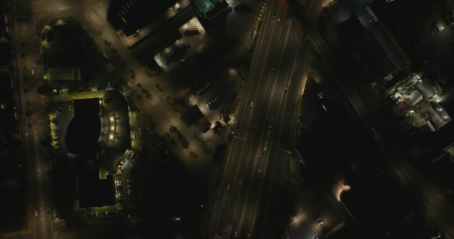 Skyline of a highway with smooth traffic at night in the urban city