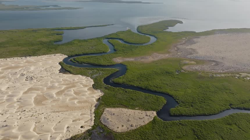 Aerial panorama of an island with vegetation and soil and river