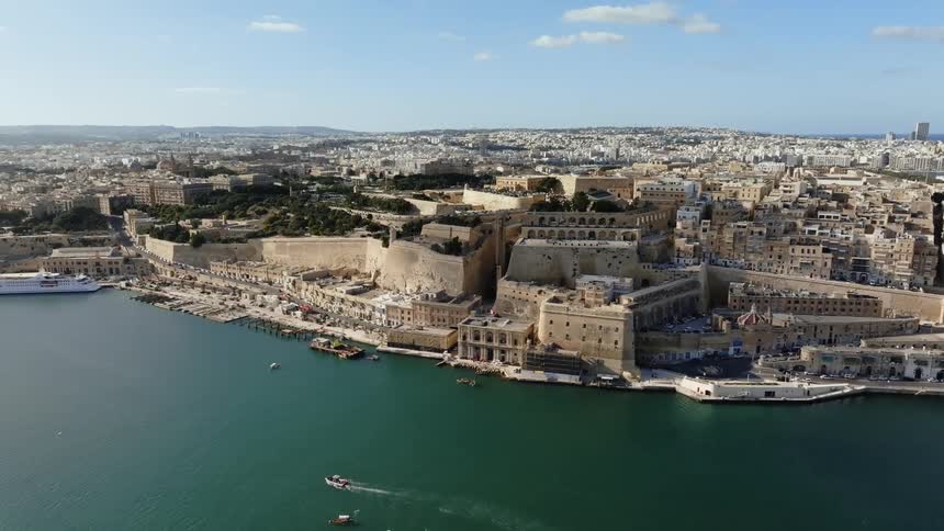 Aerial panorama of a vintage city and a seaside peninsula