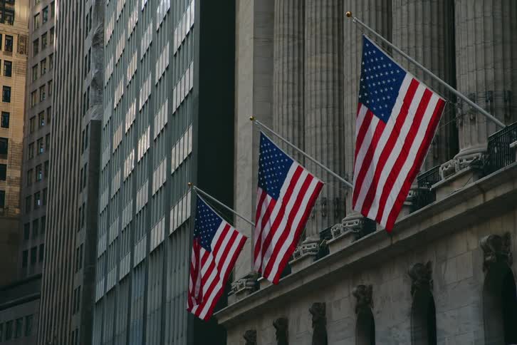 Flags hang from the building