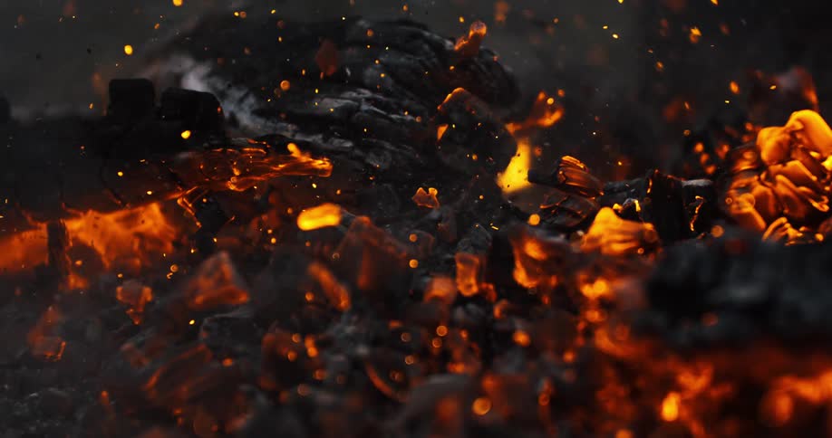 Burnt ember flying in slow motion