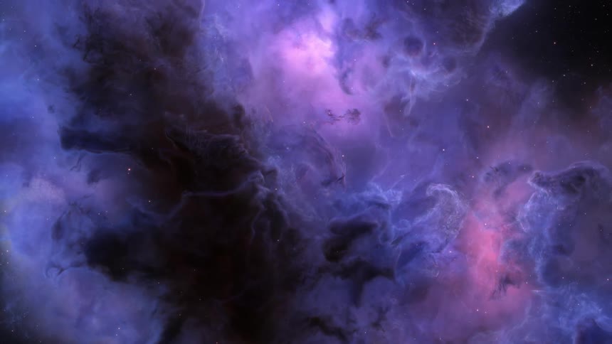 A colorful nebula filled with bright purple and blue hues in space