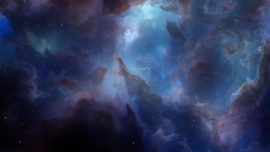 Blue clouds and stars of a nebula galaxy floating through outer space