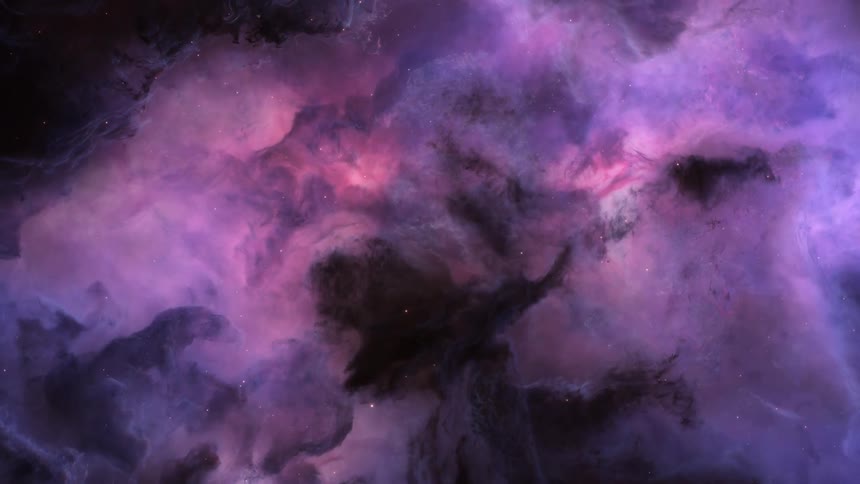 A colorful filled with bright pink and blue hues nebula in space
