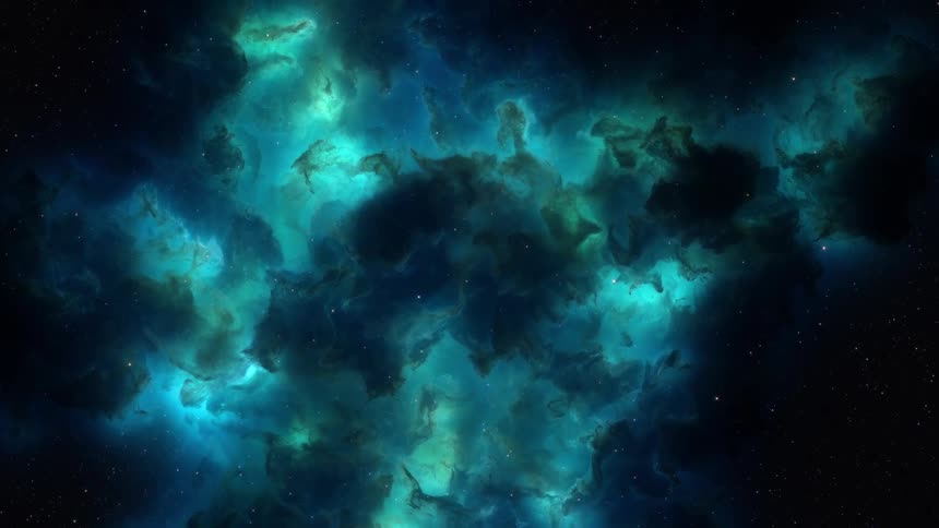 Inner layers of blue and gray nebula glow brightly while it rotates against star filled space