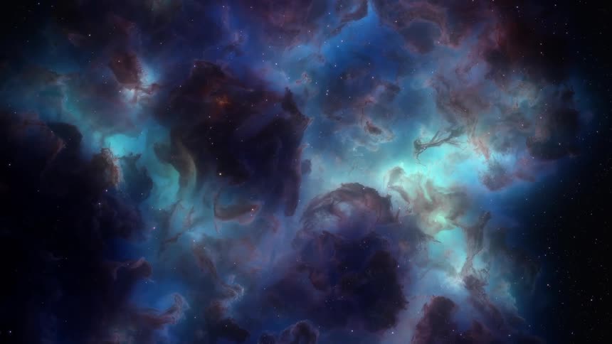 A colorful nebula filled with bright green and blue hues in space
