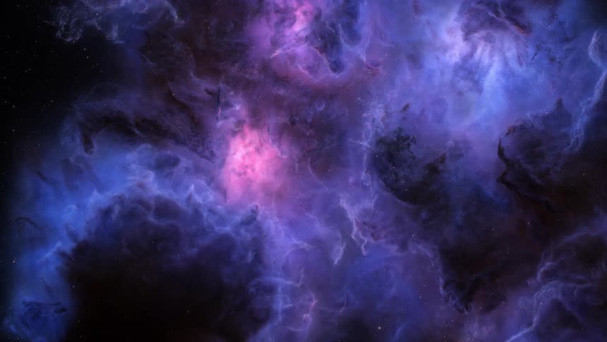 A colorful nebula filled with bright pink and blue hues in space