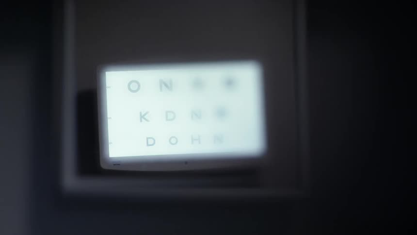 Closeup on a small digital screen with letters