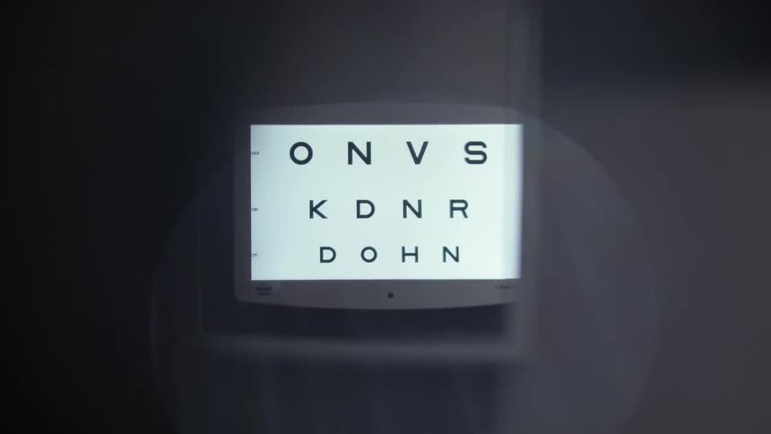 A letter based eye test on an optometry monitor getting blurry as different lenses get tested