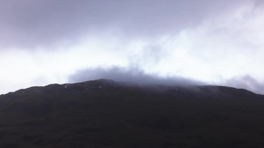 Mountain a level from the clouds on a cloudy day