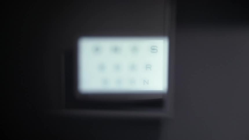 A monitor with black letters on a white screen