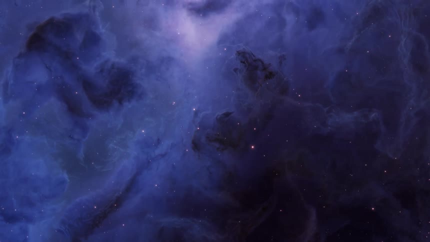 A colorful nebula filled with bright purple and blue hues in space