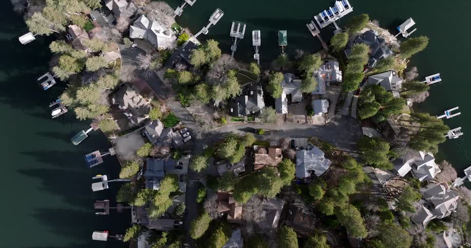 Aerial panorama of a residential neighborhood with access to the sea on an island