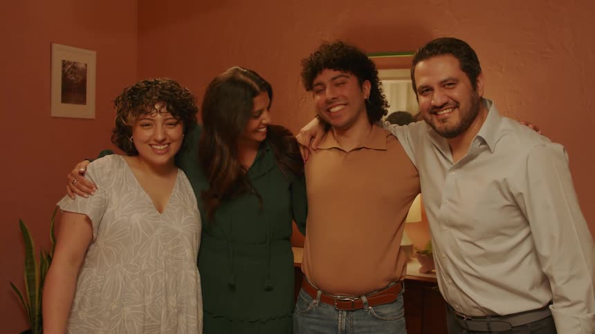 A family hug each other