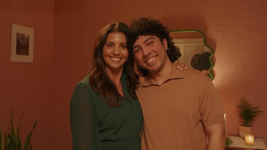 A portrait of a mom and her son smiling