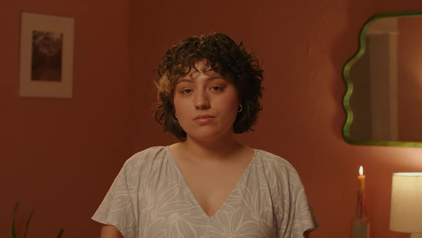 Closeup of a young womans face in a room