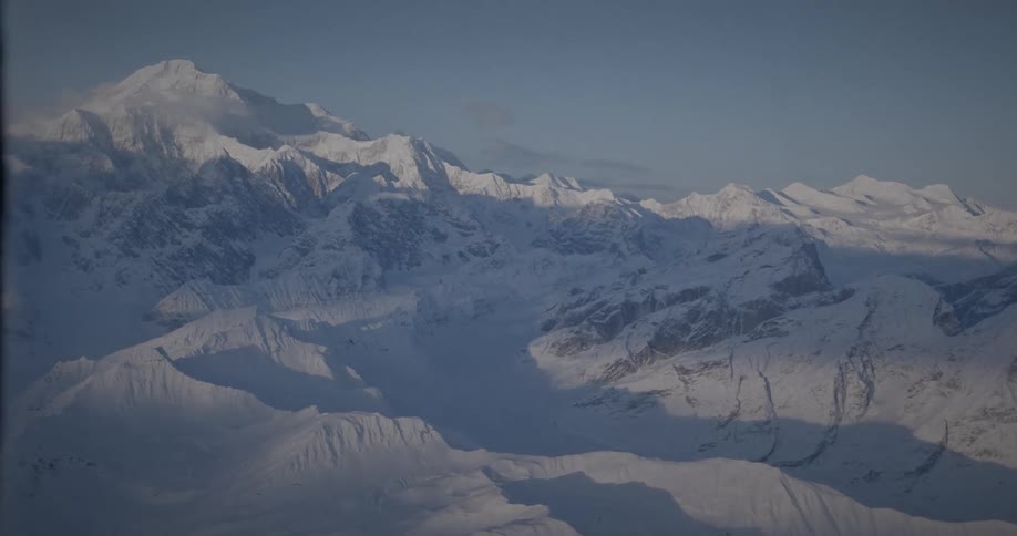 Aerial view of snowy mountain range