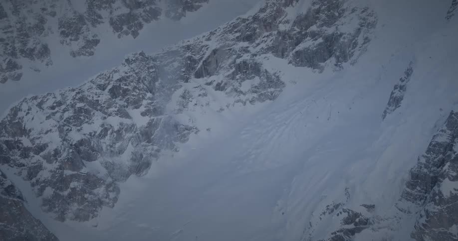 Aerial of a mountain with avalanche during winter