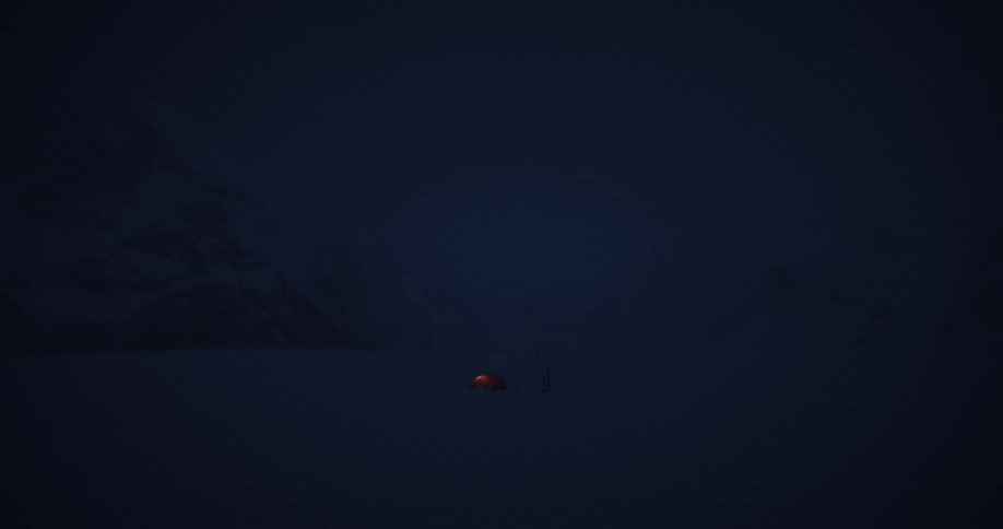 The light in the tent turns on during a snow storm