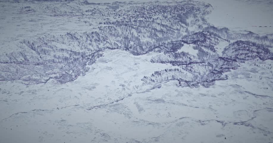 A region with the entire ground covered in snow and ice