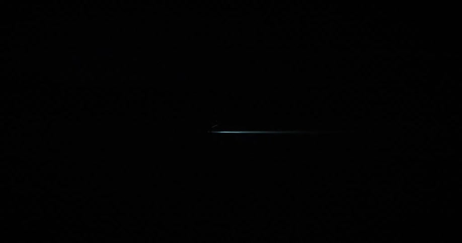 A beam of light in the dark night