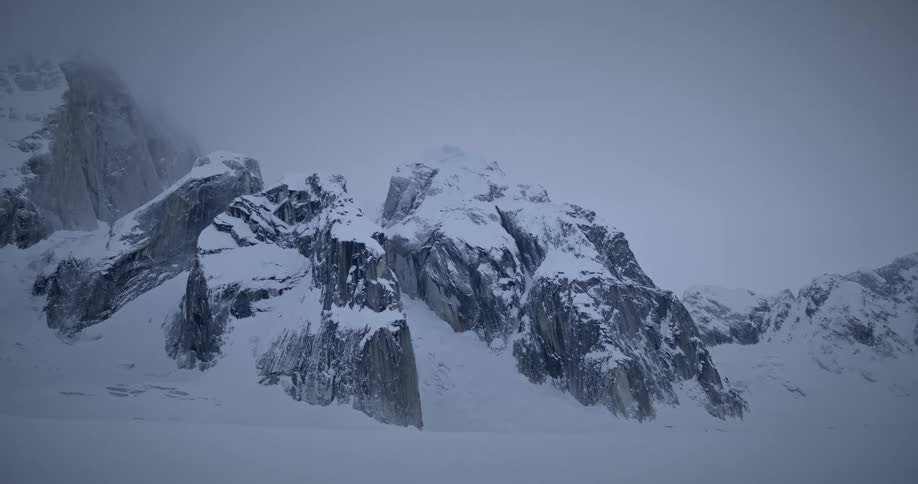 Rocks covered in snow during the day