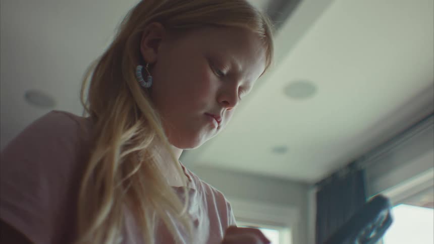 A girl is using her cell phone