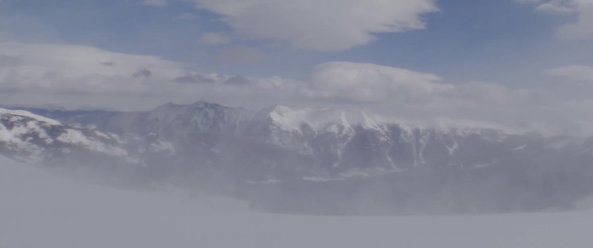 Landscape of mountain ranges covered by snow in daylight