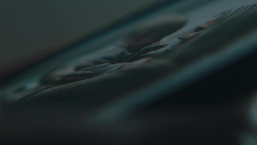 Close up of a finger scrolling through the internet on a smartphone