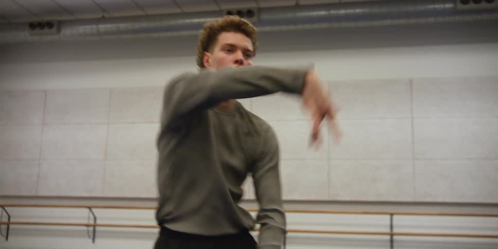 A man is dancing in the studio