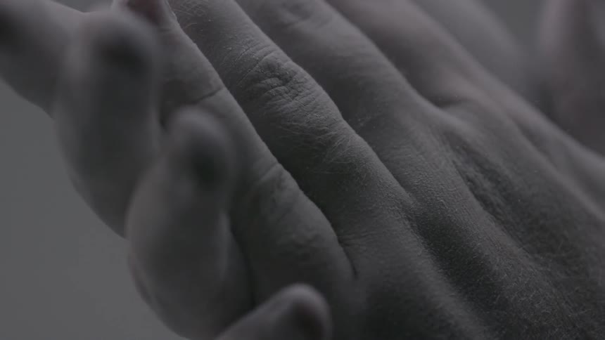 A person putting hands together