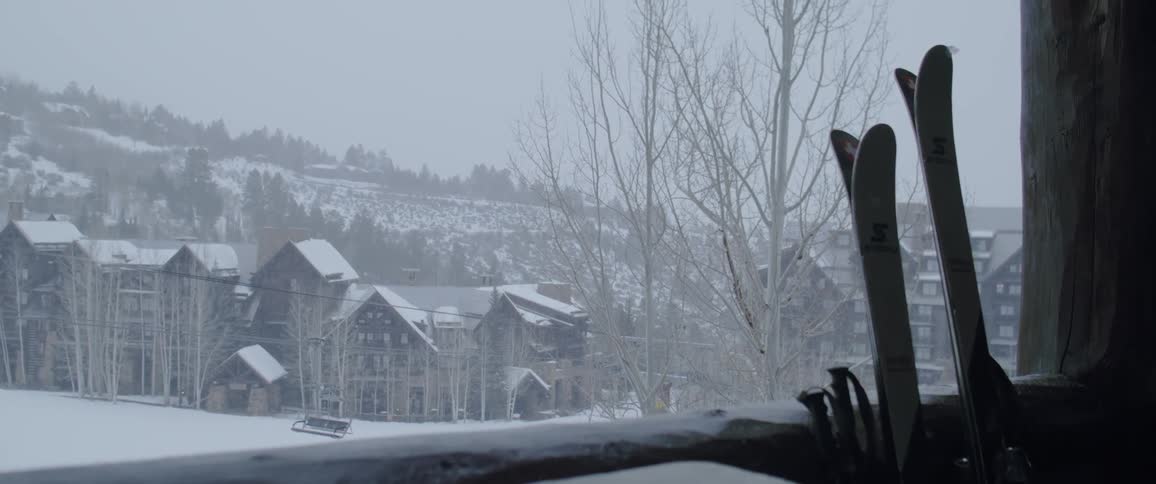 A neighborhood covered in snow during a winter blizzard