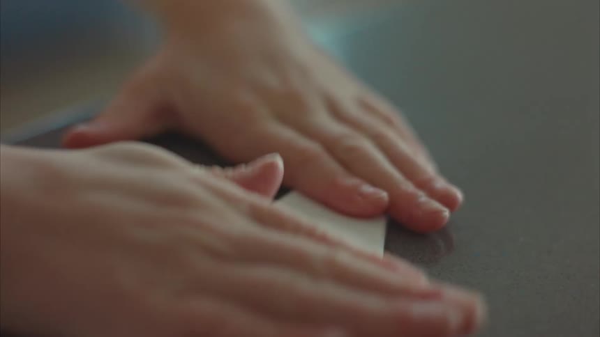A clip of an hand creating a paper plane