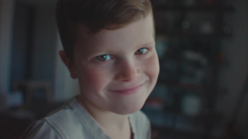 Closeup of a boys face smiling