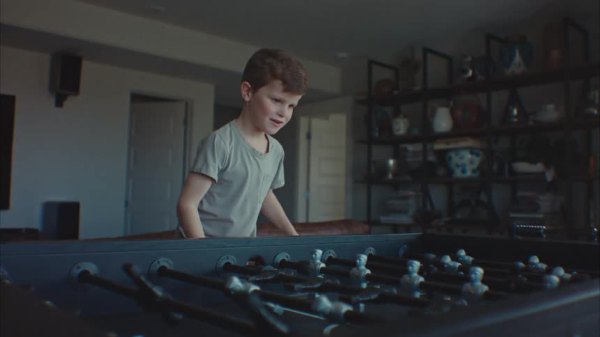 A clip of a boy playing a game
