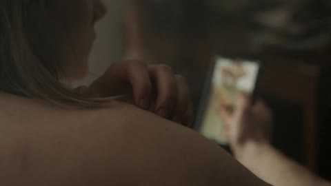 Woman looking at a cell phone