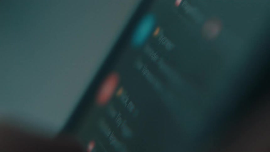Fingers scrolling across a cell phone screen