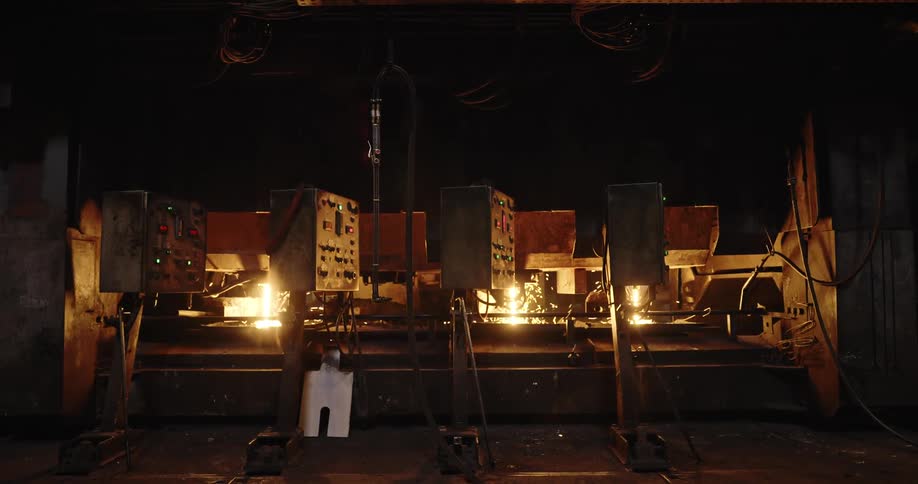 Probing machines in a factory with lit flames