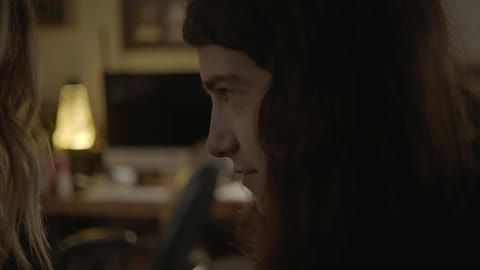 A person looks around smiling