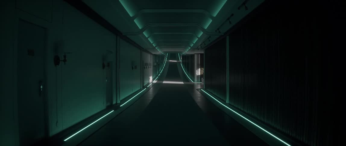 A clip of a curved corridor on a rotating space station
