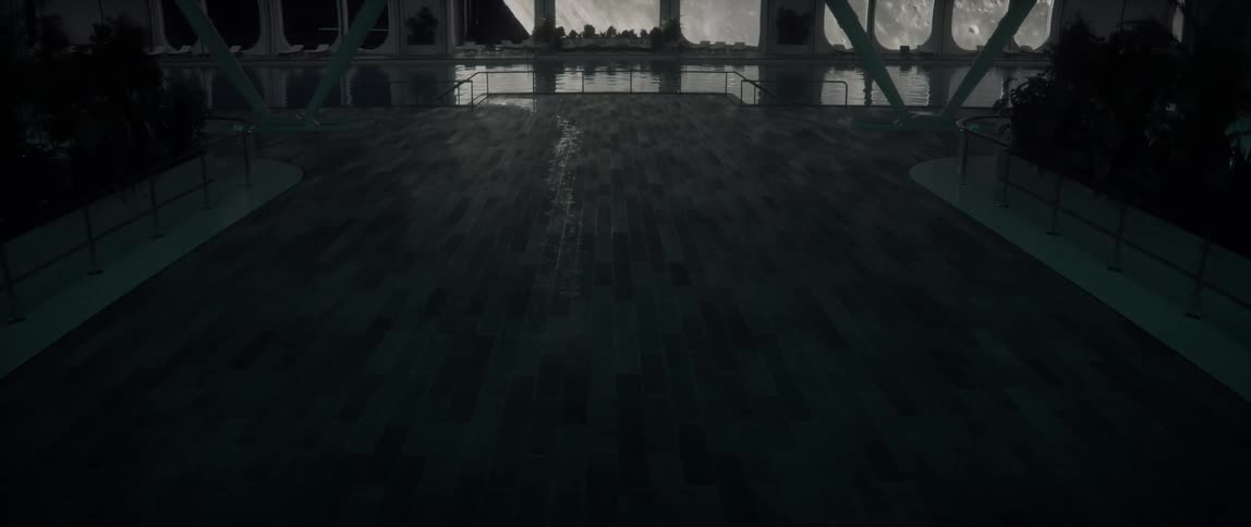 The moon reflected in a swimming pool on a rotating space station