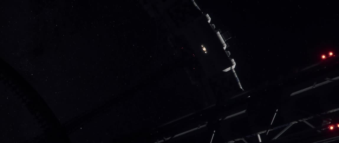 Exterior of a rotating space station in deep space, lights on in one lonely set of windows