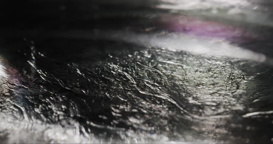 Texture of an abstract liquid in slow motion splashing