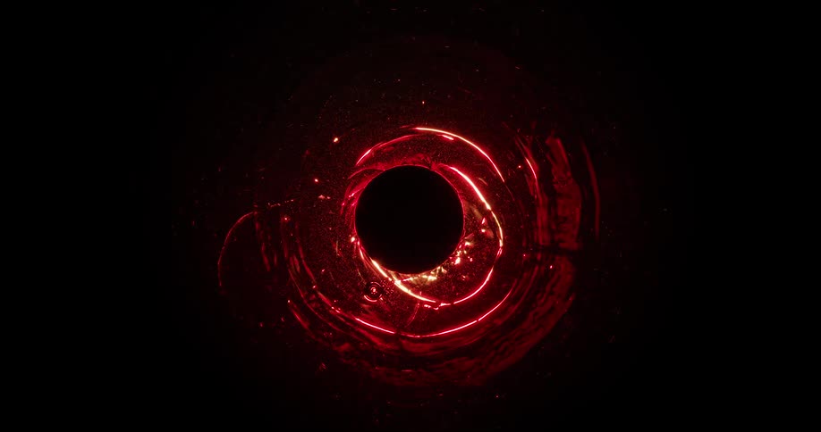 Red lights move around the black hole