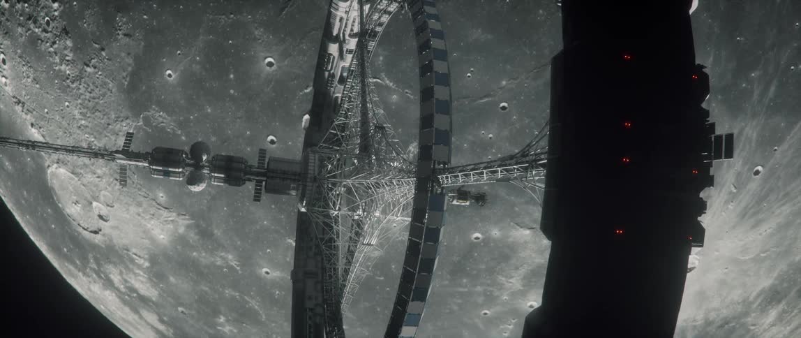 Pov of the moon as seen from outside a rotating space station