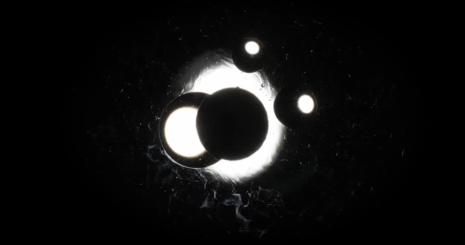 Abstract liquid dissolving and formed small bubbles on a black background