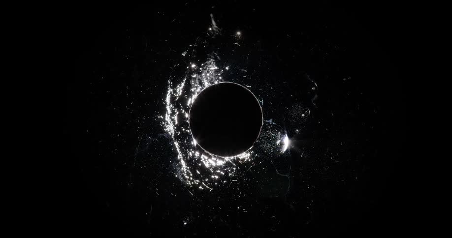 Shiny and abstract liquid in motion in the middle of a black hole