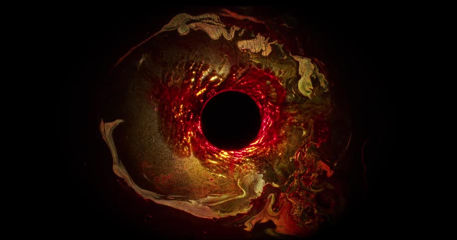 Fluid with bright golden and reddish color in abstract movement and in the middle of a black hole
